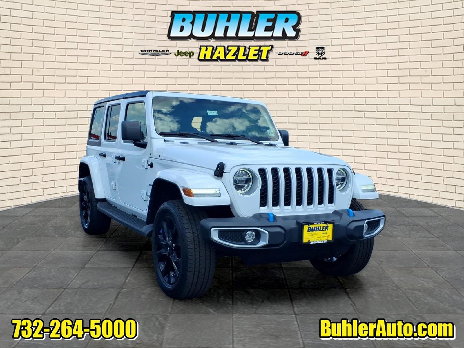 2022 Jeep Wrangler 4xe Unlimited Sahara 4x4 in Bright White Clearcoat — front three-quarter view