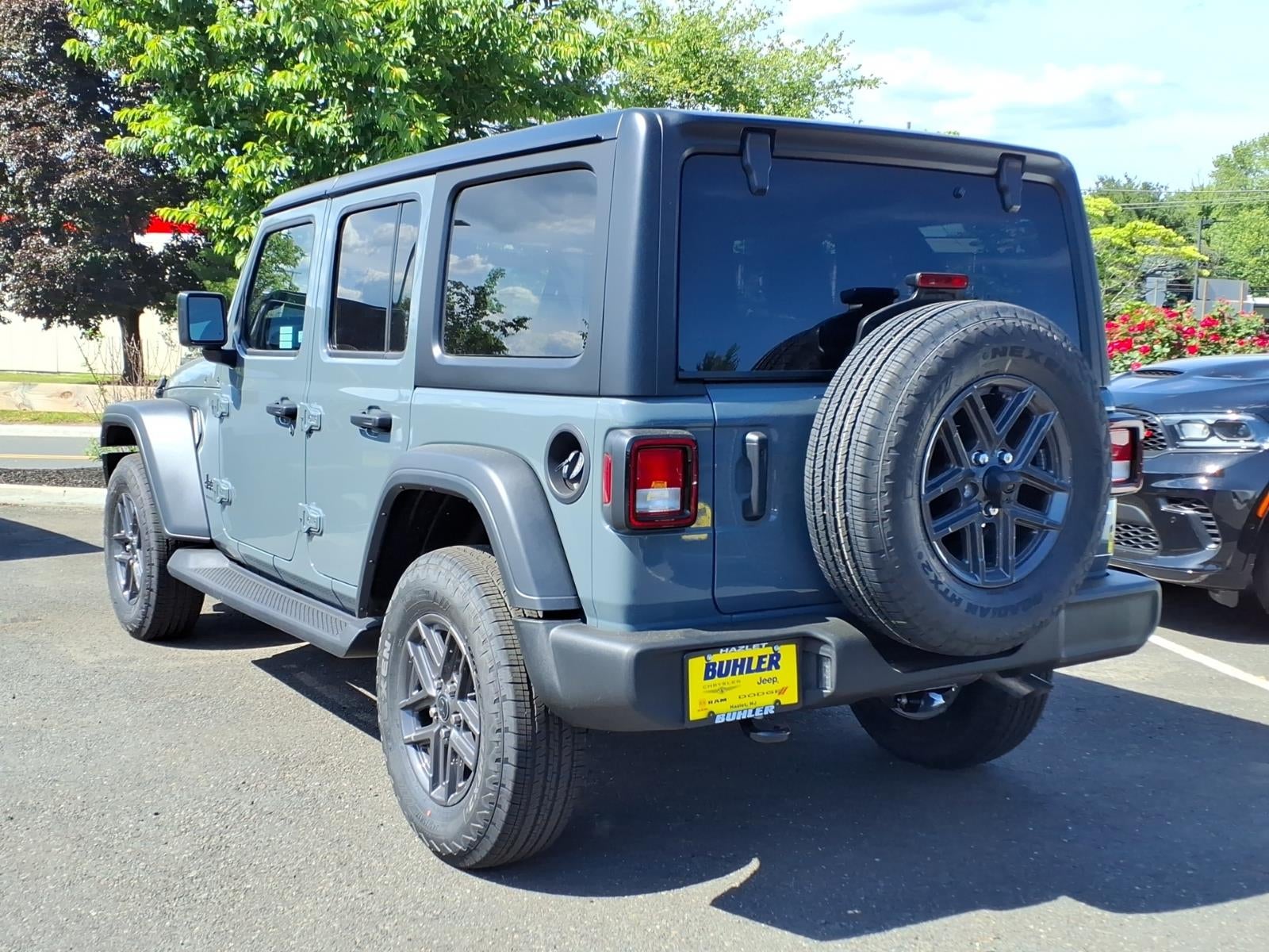 2026 Jeep Wrangler — rear three-quarter view