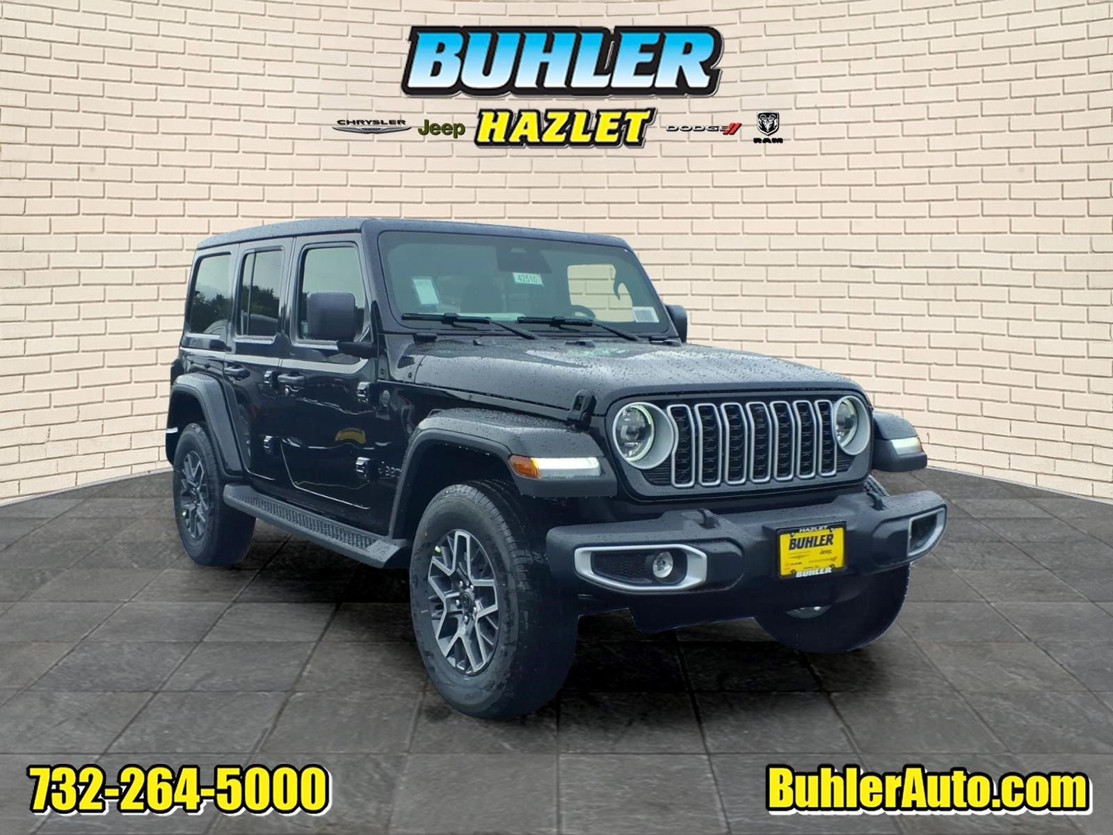 2026 Jeep Wrangler WRANGLER 4-DOOR SAHARA in Black Clear-Coat Exterior Paint — front three-quarter view