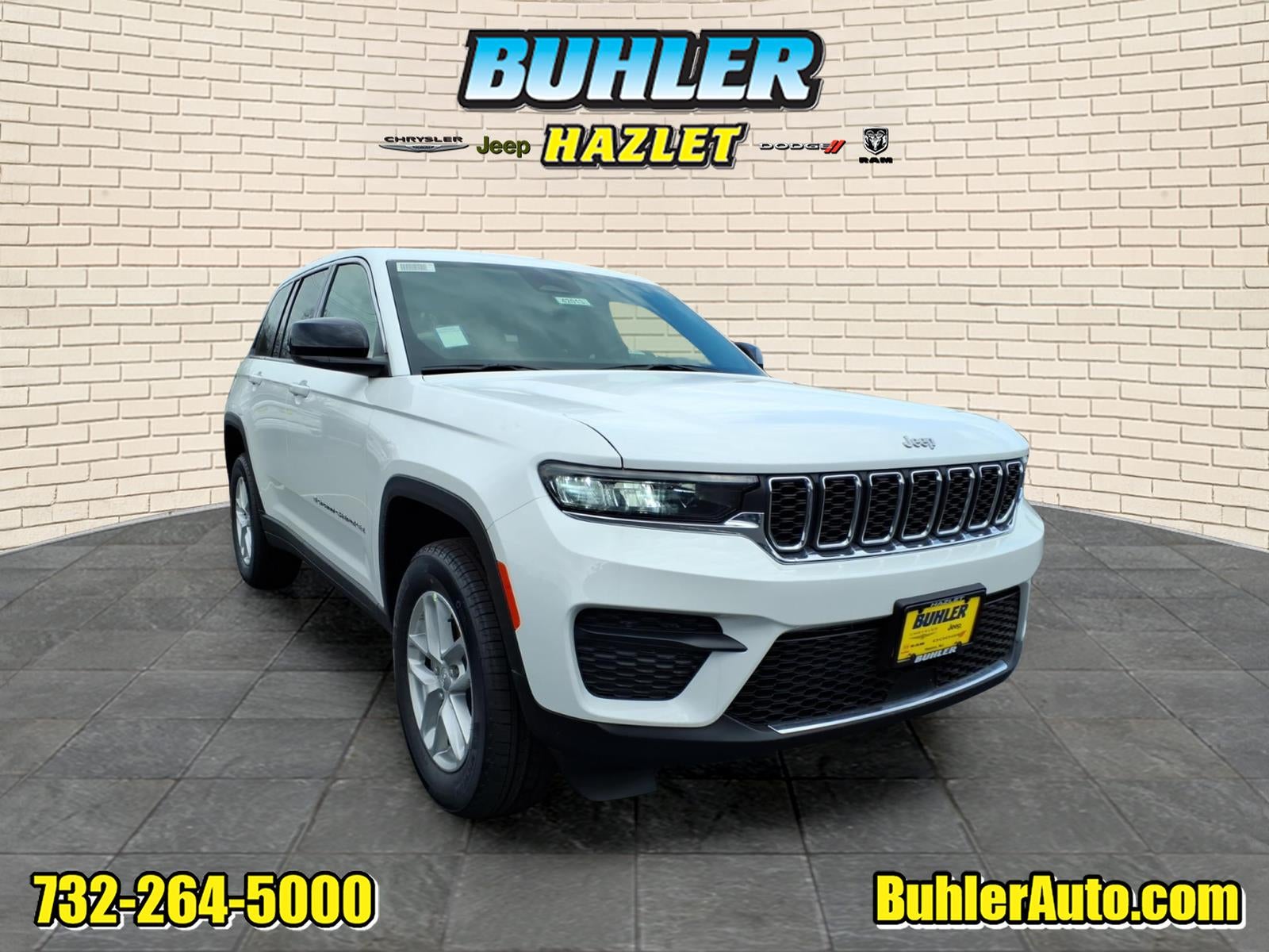 2026 Jeep Grand Cherokee GRAND CHEROKEE LAREDO 4X4 in Bright White Clear-Coat Exterior Paint — front three-quarter view