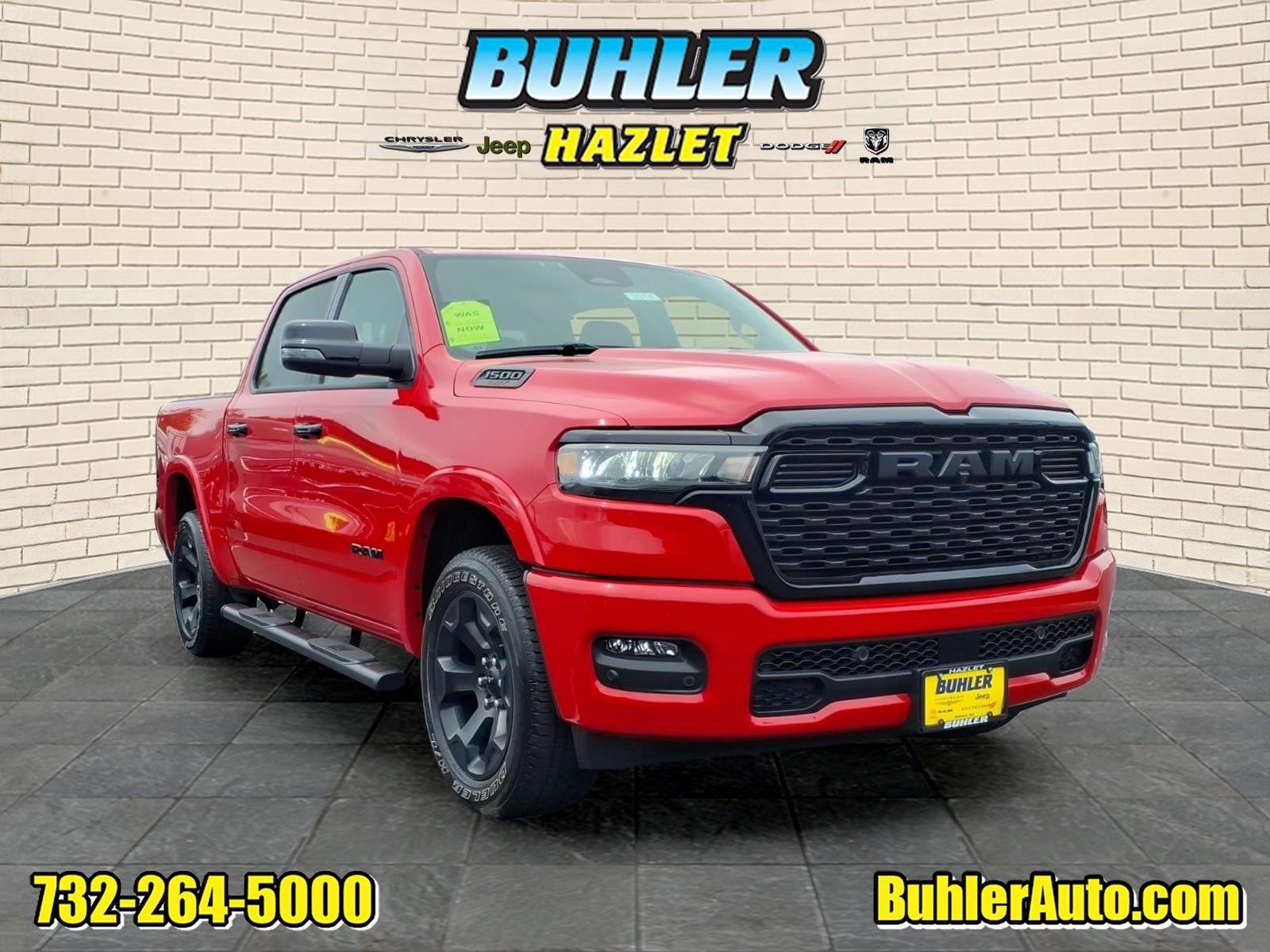 2025 RAM 1500 Big Horn Crew Cab 4x4 5'7' Box in Flame Red Clearcoat — front three-quarter view
