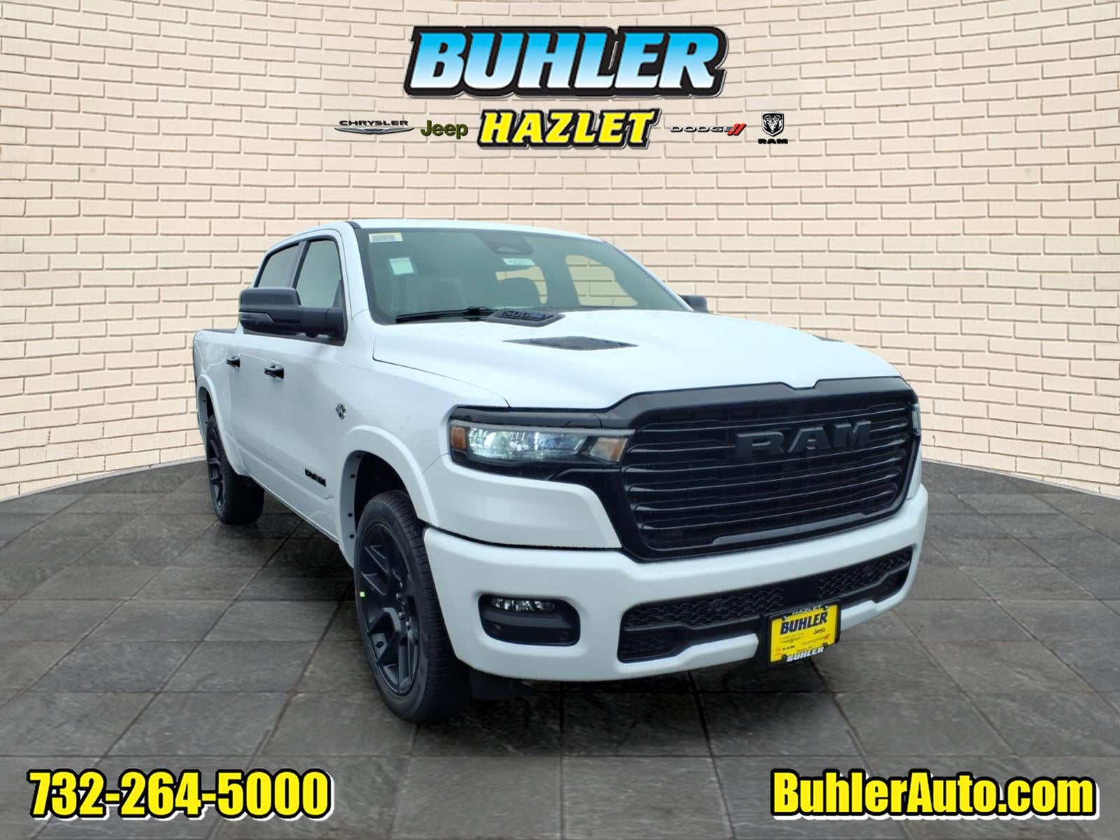 2026 RAM Ram 1500 RAM 1500 LARAMIE CREW CAB 4X4 5'7' BOX in Bright White Clear-Coat Exterior Paint — front three-quarter view