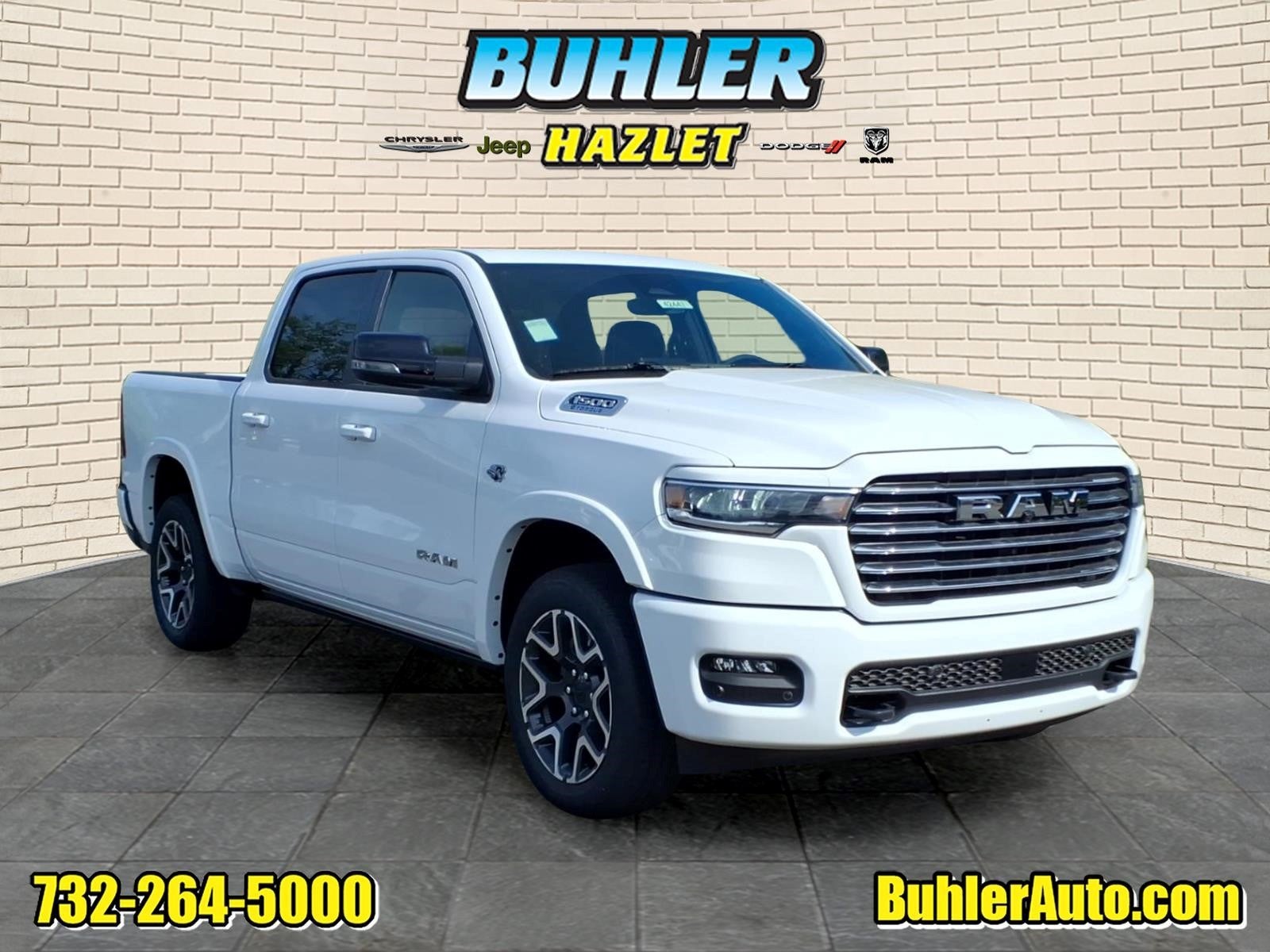 2026 RAM Ram 1500 RAM 1500 LARAMIE CREW CAB 4X4 5'7' BOX in Bright White Clear-Coat Exterior Paint — front three-quarter view