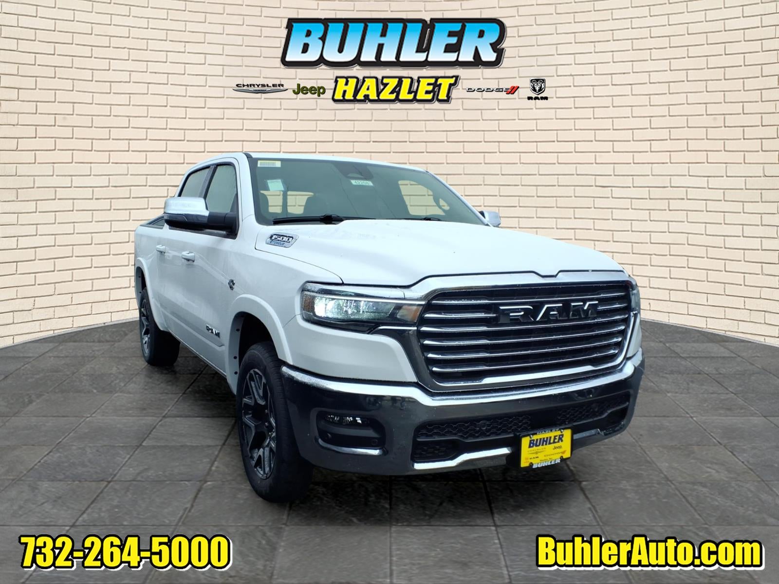 2026 RAM Ram 1500 RAM 1500 LARAMIE CREW CAB 4X4 5'7' BOX in Bright White Clear-Coat Exterior Paint — front three-quarter view