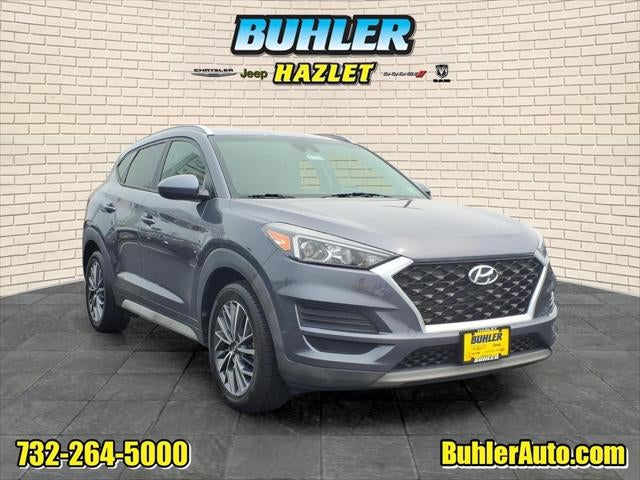 2021 Hyundai Tucson SEL in Magnetic Force — front three-quarter view